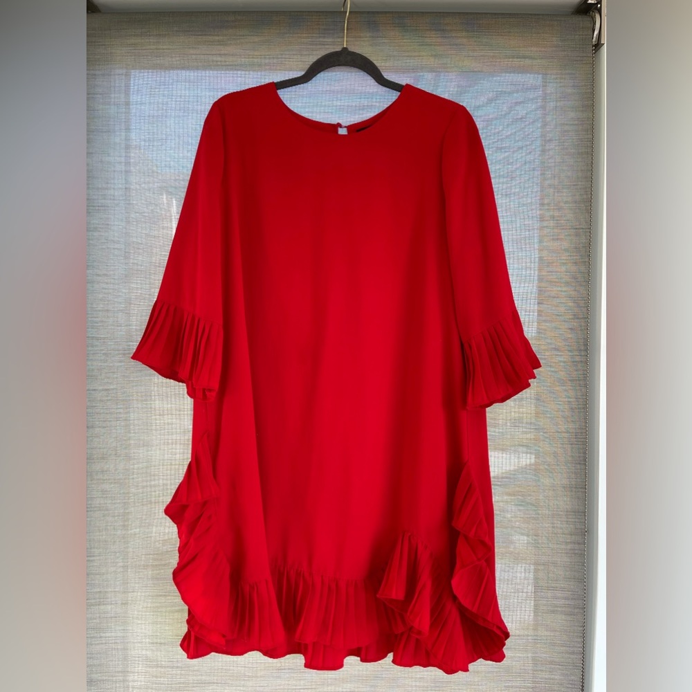 Beautiful, red, ruffled cocktail dress for holidays. Polyester, wrinkle free.